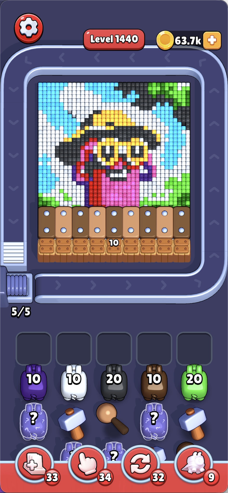 A little pink person wearing a yellow hat