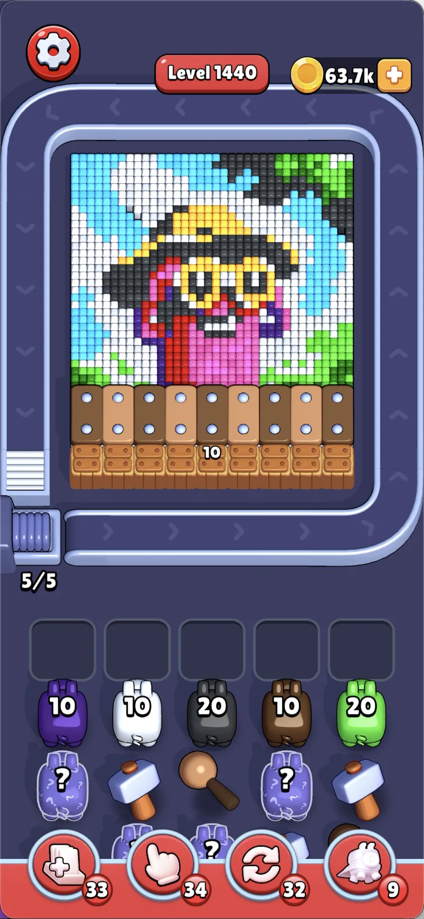 A little pink person wearing a yellow hat